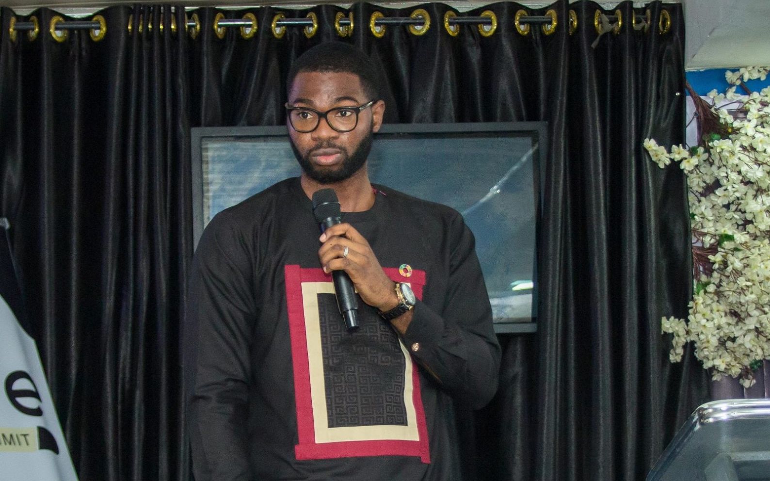 Abraham Ologundudu speaking at Thrive Business Summit, 2022